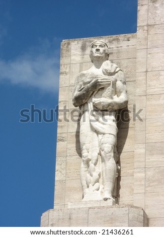 An sculpture of aboriginal from latin-america, made in marble. Location: Rosario city, Argentina