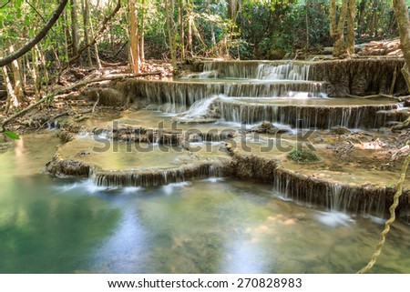 Waterfall in deep tropical Forest in summer , Huay Mae Kamin Waterfall Karnjanaburi Thailand