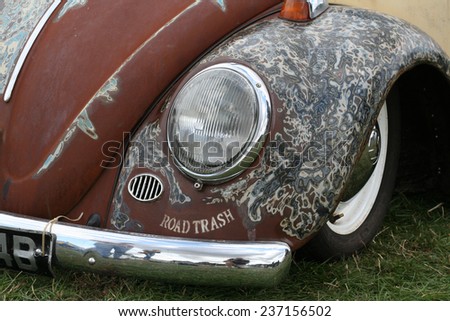 Grunge, classic car bonnet. Rusty metal finish car body.