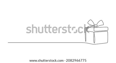 One Continuous line drawing of Christmas Present box with ribbon and bow. Festive present and Wrapped surprise package in simple linear style. Doodle vector illustration