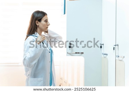 Similar – Foto Bild Müde weibliche Krankenschwester im Krankenhaus Korridor