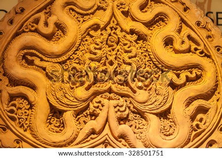Hanoi , Vietnam, october 16 2015 a big ridge-tile, shaped in bodhi-leaf with dragon decoration , ly dynasty , 11th-12th centuries