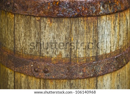 old wooden barrel with iron rims