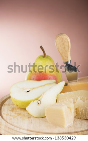 cheese and fruit on a white background