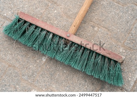 Similar – Image, Stock Photo Street broom with red bristles, makes weekend on the construction site. Plaster walls are freshly filled and the screed floor has hardened