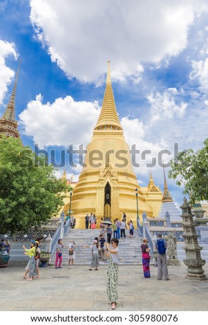 BANGKOK, THAILAND - August 14, 2015: Tourists visit the Grand Palace in Bangkok, Thailand on August 14  2015. Grand Palace in Bangkok is the most famous temple and landmark of Thailand.
