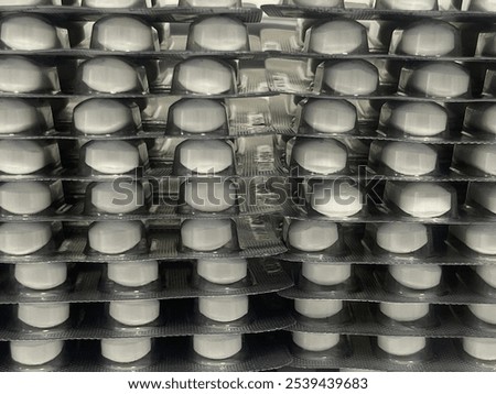 Similar – Image, Stock Photo Stacked tablets in blister pack