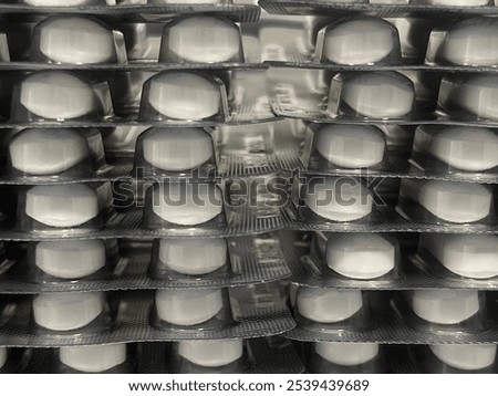 Similar – Image, Stock Photo Stacked tablets in blister pack