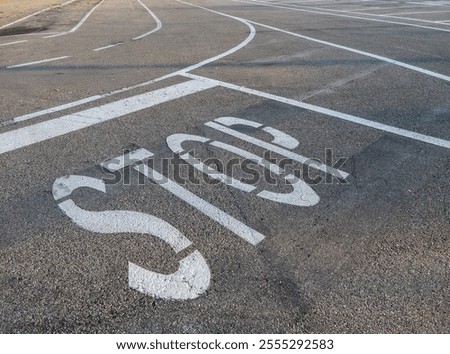 Similar – Image, Stock Photo A painted stop on a wooden board
