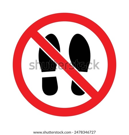 Shoes not allowed or remove footwear warning sign red prohibited ban symbol in red and black color. Shoes, sandals and slippers not allowed.