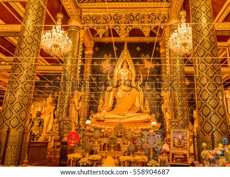 golden buddha at temple in Thailand.