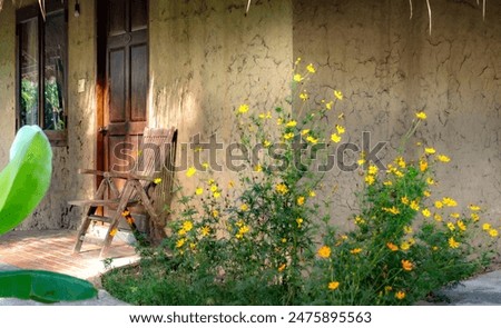 Similar – Image, Stock Photo Vintage wooden chair next to trash bin on the public street