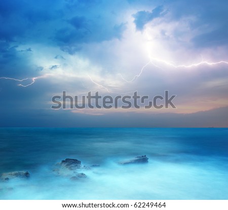 Rocks and sea storm. Dramatic scene. Composition of nature
