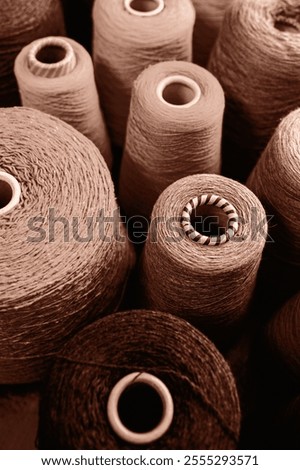 Similar – Image, Stock Photo Spooling up of yarn for knotting on a loom.