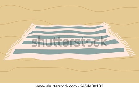 Striped beach towel or fringed blanket