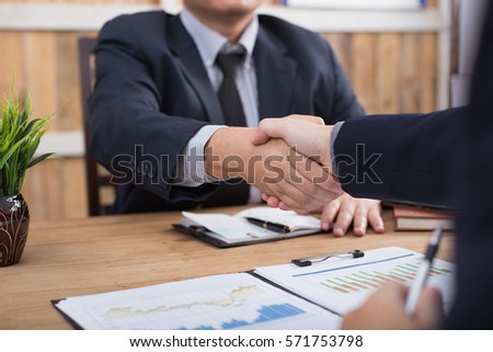business handshake congratulations on
