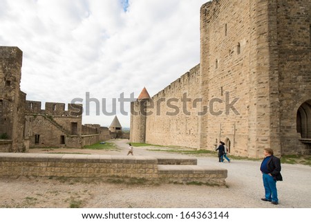 Carcassonne, France - November 2: Tourists in the medieval city of Carcassonne, France on November 2, 2013. Carcassonne medieval city is UNESCO World Heritage site.