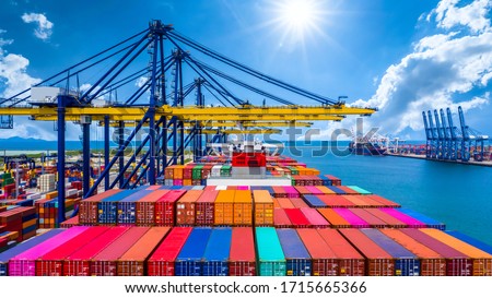 Container ship unloading in deep sea port, Global business logistic import export freight shipping transportation oversea worldwide by container ship open sea, Container vessel loading cargo freight.