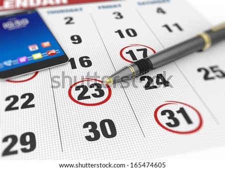 Pen and smart phone on calendar