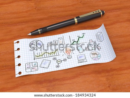 Note paper with pen and flow charts