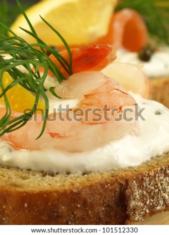 Appetizing sandwich with shrimps and cottage cheese