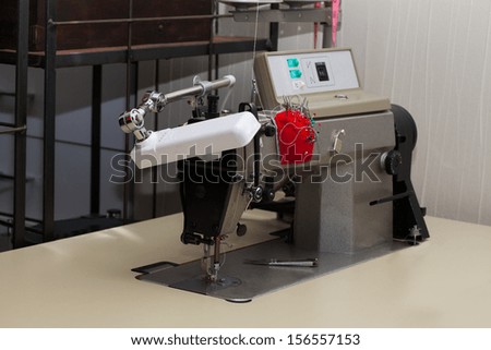 Sewing machine in tailor shop, close up