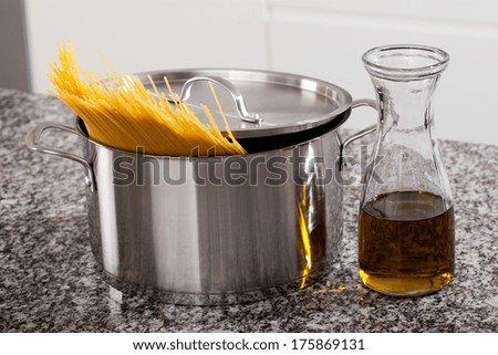 Pasta in the pot and oil ready to cook lunch