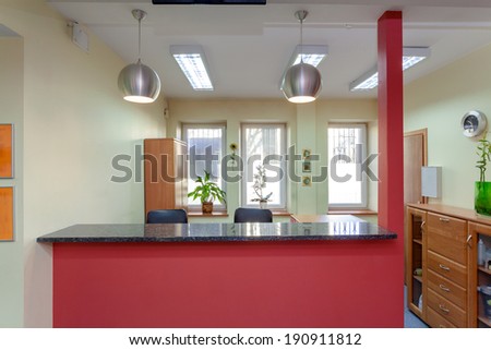 Reception desk in small medical clinic, horizontal