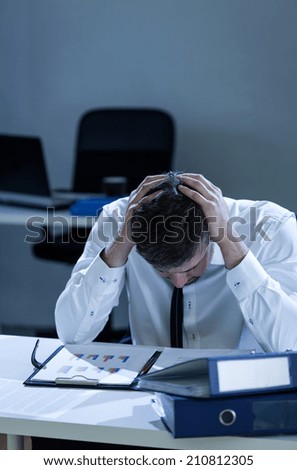 View of man during overtime at work