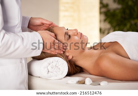 View of head massage in spa room