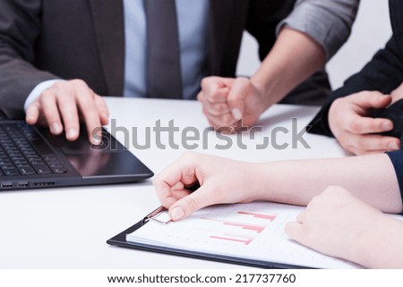 Horizontal view of clenched fist of businesswoman