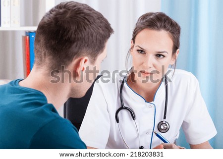 Man having medical consultation in doctor\'s office
