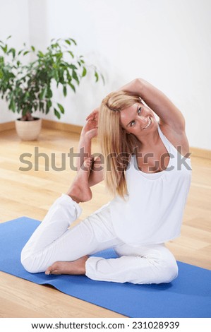 Image of woman in advanced yoga position