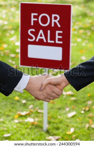 Close-up of purchase agreement between buyer and realtor