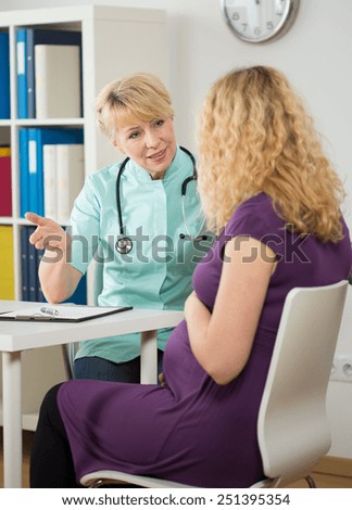 Young pregnant woman at the doctor\'s office