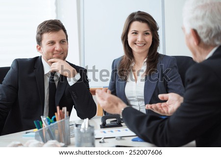 Three entrepreneurs during business conversation
