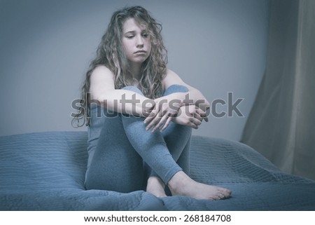 Young sad woman in depression discourage her life