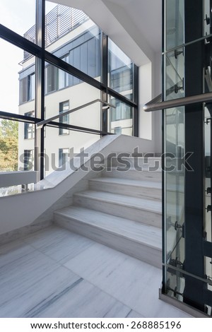 View of polished stairs in office building