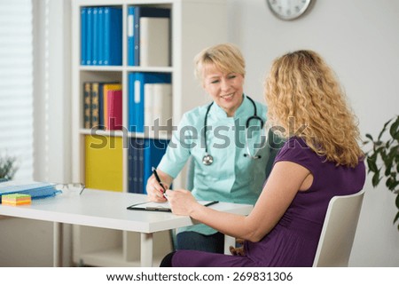 View of pregnant woman during medical appointment