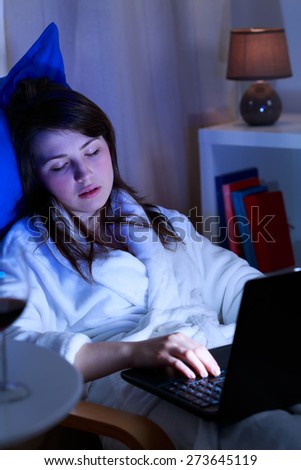 Image of drunk girl sleeping with laptop