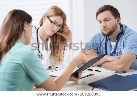 Conversation in doctors room about new patient
