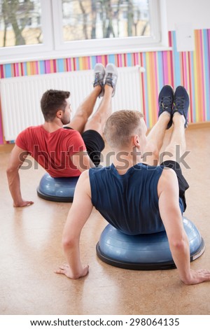 Vertical view of men during balance training