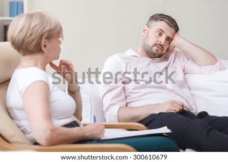 Picture of female psychologist helping man with depression