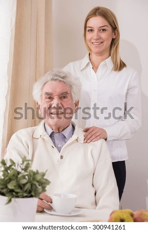 Image of senior care assistant and retiree