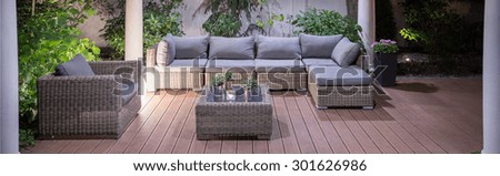 Lovely furniture in luxury villa backyard patio