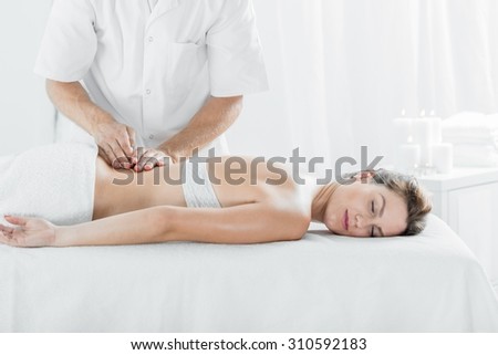 Picture of professional health massage treatment in spa salon