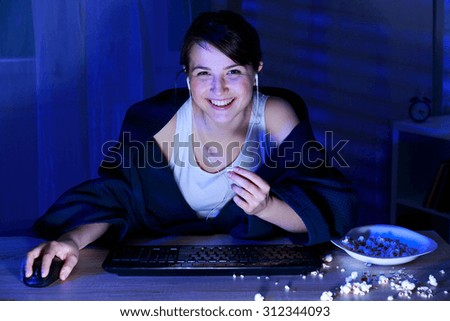 Young woman is having a video call with her friends