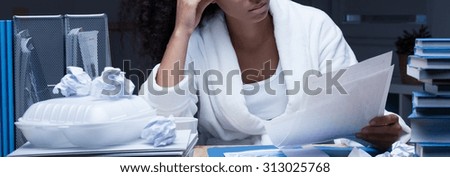 Panorama of young woman studying for examination session
