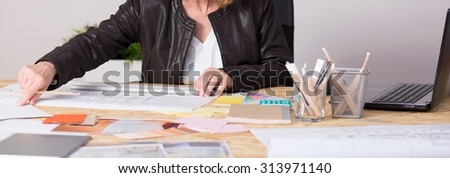 Panorama of hard working mature woman leading family business