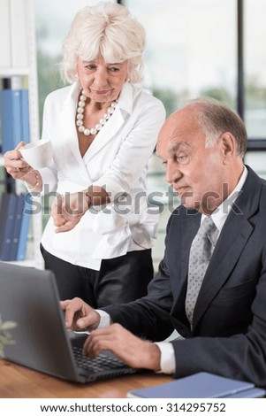 Elder female boss is giving the orders